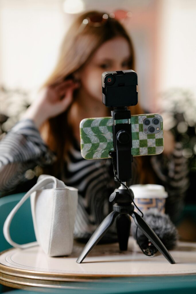 pexels-photo-13929780-13929780 Influencer Recording with Smartphone